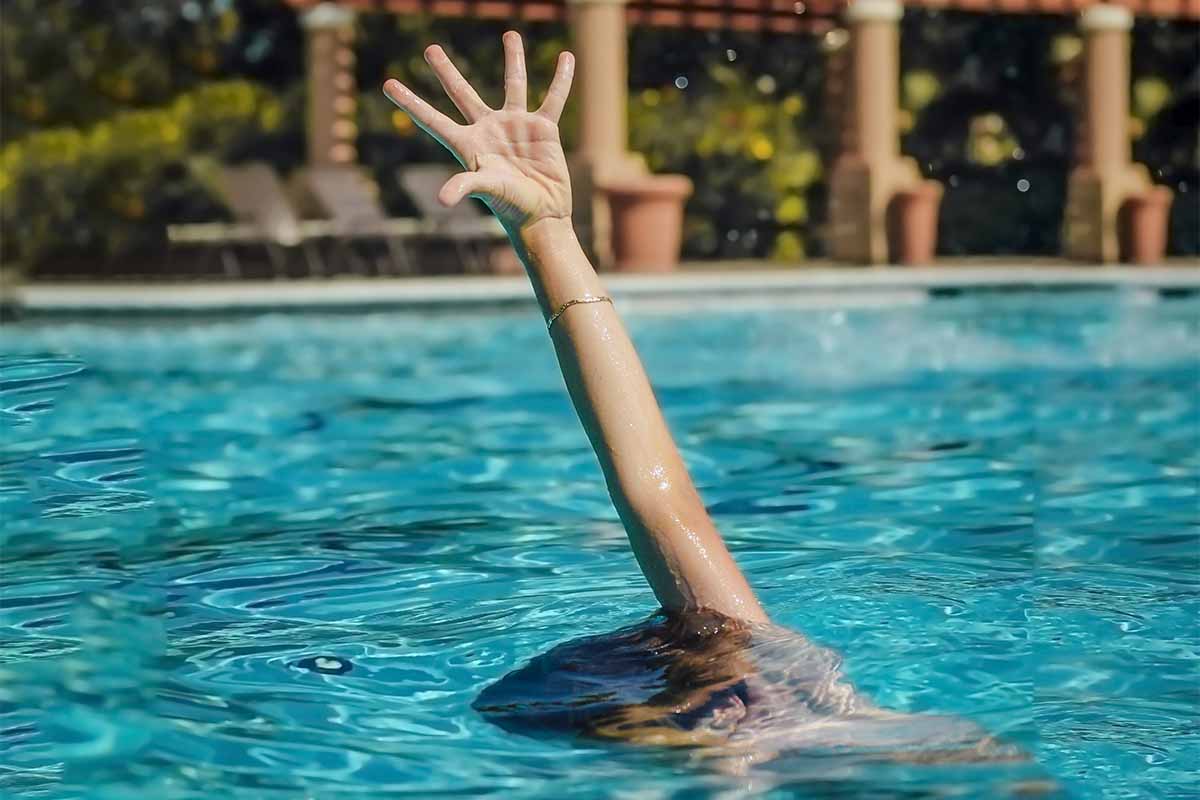 Person drowning in pool