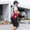 A person carrying the Grab & Go First Aid Kit