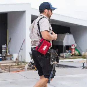 A person carrying the Grab & Go First Aid Kit