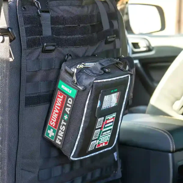 The Vehicle First Aid Kit attached to the back seat of a car