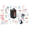 All the contents of the Vehicle First Aid Kit displayed around it